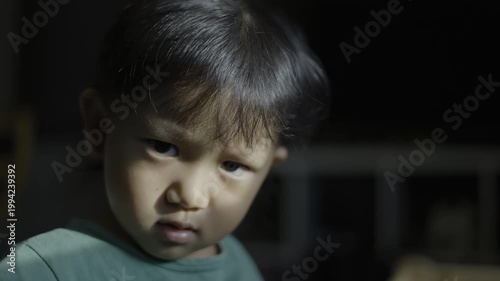 Cute Toddler Playing With A Toy Car And Looking At The Camera, A video of a toddler playing with a toy car at the camera, perfect for family lifestyle documentary and toy.