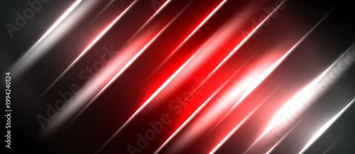 Abstract red lines streak across dark background. Bright illumination creates dynamic visual effect. Modern design element.