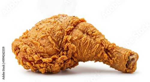 Crispy fried chicken drumstick with golden breading, crunchy deep fried poultry leg, savory fast food snack with textured skin and steam isolated on White Background