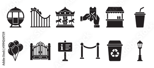 A black and white vector illustration showcasing various icons representing elements of an amusement park, including rides, food, and facilities, suitable for design projects.