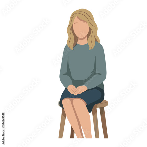 Woman sits on a stool indoors with crossed legs and hands together