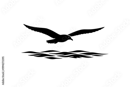 A solitary bird soars over the rolling ocean waves.