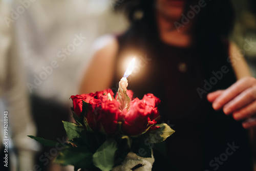 woman holding a candle