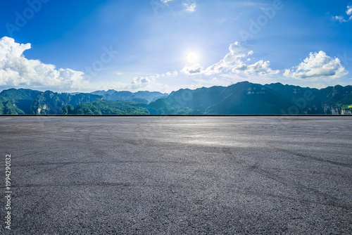 Empty asphalt road and majestic mountain landscape in Zhangjiajie, Hunan, China. Road trip and travel concept.