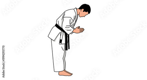 Man in karate gi bowing respectfully.