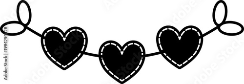 Three hearts hang on a string