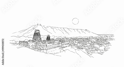 Historic Indian city skyline dominated by ancient temple towers and mountain