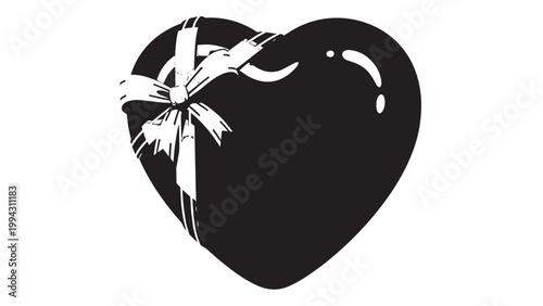 Close-up of a Heart-shaped Fruit with a Leaf and Stem.