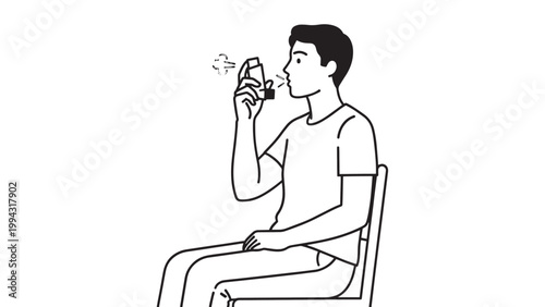Young man sitting on a chair and drinking from a glass in a casual setting.