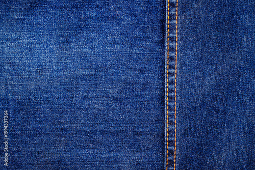 Photography Denim fabric showing the texture and stitching details suitable for clothing and