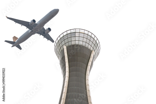 Flight cancellations or delays. Airport control tower and passenger plane against a white sky background. Air transportation. Aviation idea concept. Travel abroad. Copy space, blank, empty. 