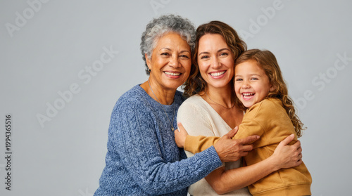 Three Generation Family Hugging Grandmother Mother and Daughter Portrait