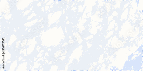 Abstract aerial view of a frozen snow covered landscape with icy patterns