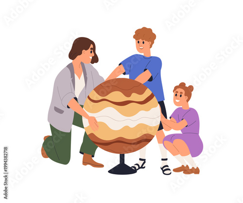 Astronomy education for kids. Teacher and school children studying Jupiter pl...