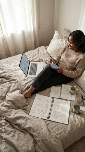 Young woman studying on bed with laptop and notebook, soft morning light through curtains, calm focused mood for home learning and productivity