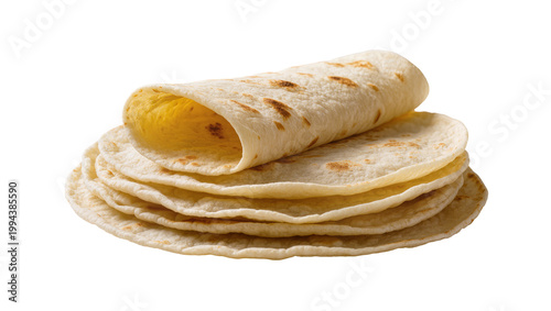 Photos Stacked golden brown flour tortillas neatly rolled together