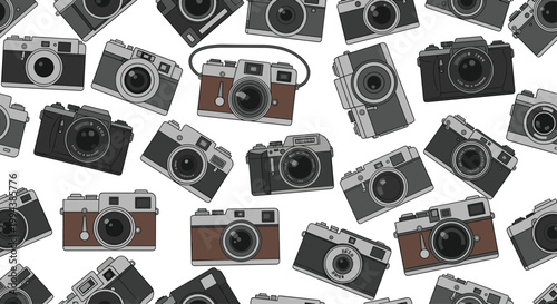 Photography themed seamless pattern with various vintage and retro film cameras scattered on a clean white background.