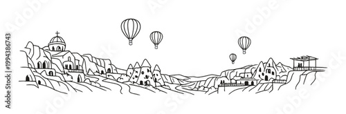 Cliff top cave dwellings with hot air balloons over valley