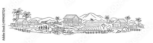 Stilt houses and rice fields in tropical countryside village