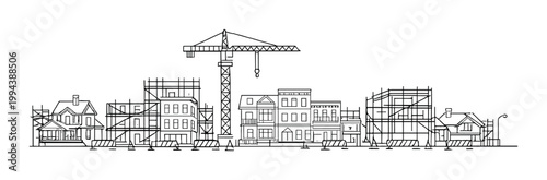 Construction site with crane and scaffolded buildings on street
