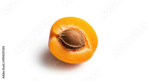 Fresh apricot half with pit, ripe orange fruit macro photography, organic sweet apricot slice for healthy food design isolated on White Background