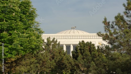 Palace of International Forums Uzbekistan in Tashkent behind trees
