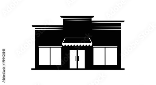 Simple storefront with awning and door.