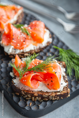 Smoked trout sandwich with cream cheese and fresh dill