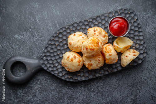 Cheese balls with sauce. Fried cheese.