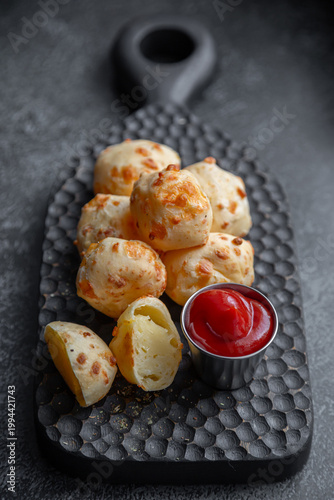 Cheese balls with sauce. Fried cheese.