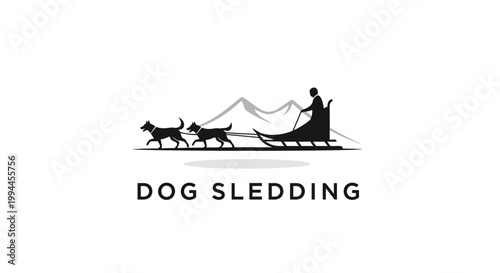 Silhouette of Dog Sledding Team in Snowy Mountain Landscape.