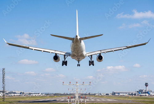 Commercial airliner on final approach to runway at international airport