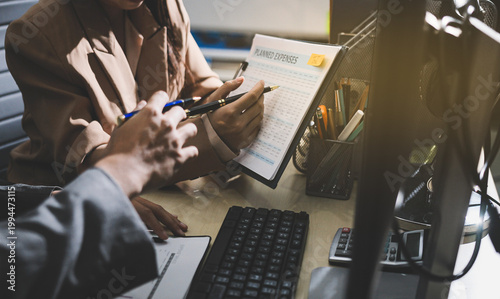 Accounting company provide finance and taxation planning for profitable cash flow, Auditor accountant working in office, analyze financial data and accounting record with calculator