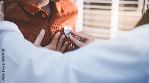 Doctor using a stethoscope checking patient with examining, presenting results symptom and recommend treatment method, Healthcare and medical concept