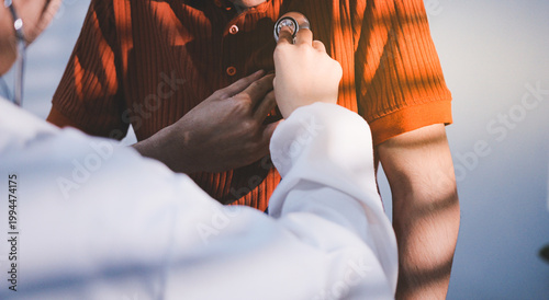Doctor using a stethoscope checking patient with examining, presenting results symptom and recommend treatment method, Healthcare and medical concept