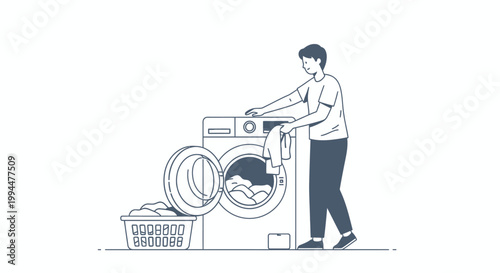Man loading washing machine with laundry clothes daily routine activity