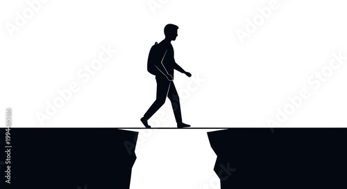 Silhouette of a person walking confidently on a narrow path over a cliff edge