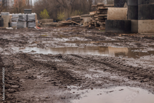Truck tracks in spring mud at a construction site