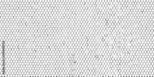 Close up of a honeycomb structure with subtle variations in texture