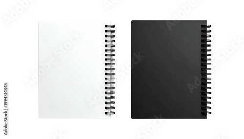 White & black spiral notebooks isolated on a black background