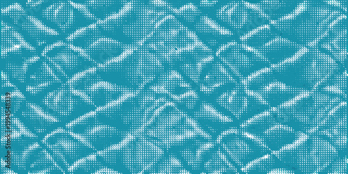 Abstract teal and white patterned textile with a woven organic design