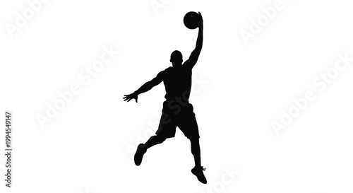 Silhouette of a basketball player jumping with the ball overhead