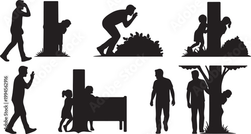 Father and child silhouettes playing hide and seek, father and child playing outdoors