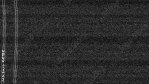 VHS television no signal screen with heavy static, glitch distortion, and analog noise.