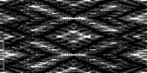 Abstract black and white textured pattern resembling a distorted face