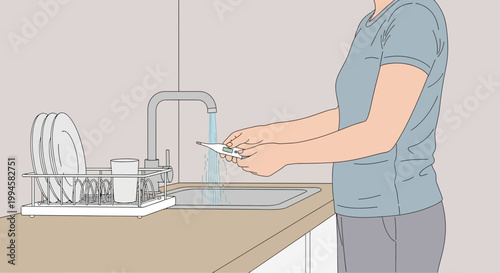 Woman washing dishes in a kitchen sink with running water and drying rack