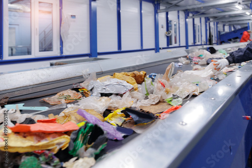 Bilde på lerret Recycling facility conveyor belt with mixed plastics and waste materials