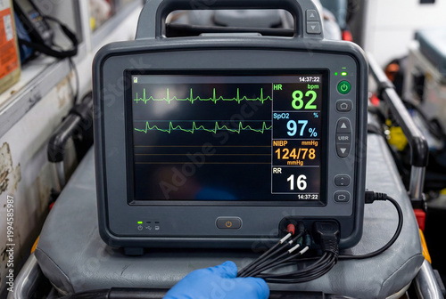 Medical Patient Monitor Displaying Vital Signs on Ambulance Stretcher
