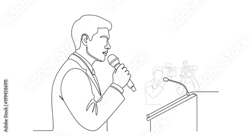 Man speaking into a microphone.