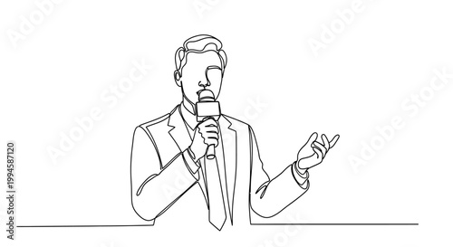 Businessman speaking into a microphone.